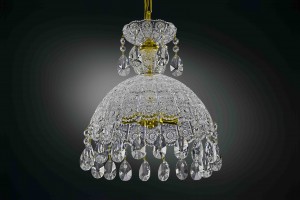 Crystal glass chandelier with gold center