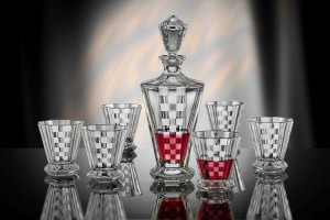 Set of glasses and bottle with chessboard pattern, made from lead crystal glass